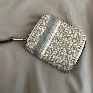 Kenneth Cole Reaction monogrammed wallet